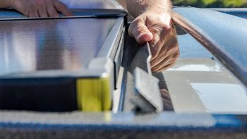 men using solar panel