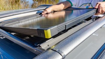 men taking out Solar Panel